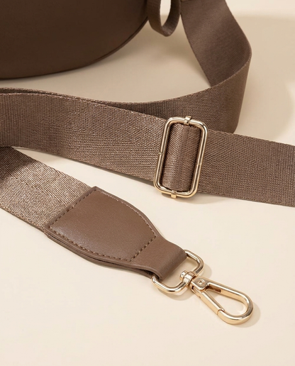 The Crescent Shoulder Bag — detail of adjustable strap with gold-tone buckle and clasp