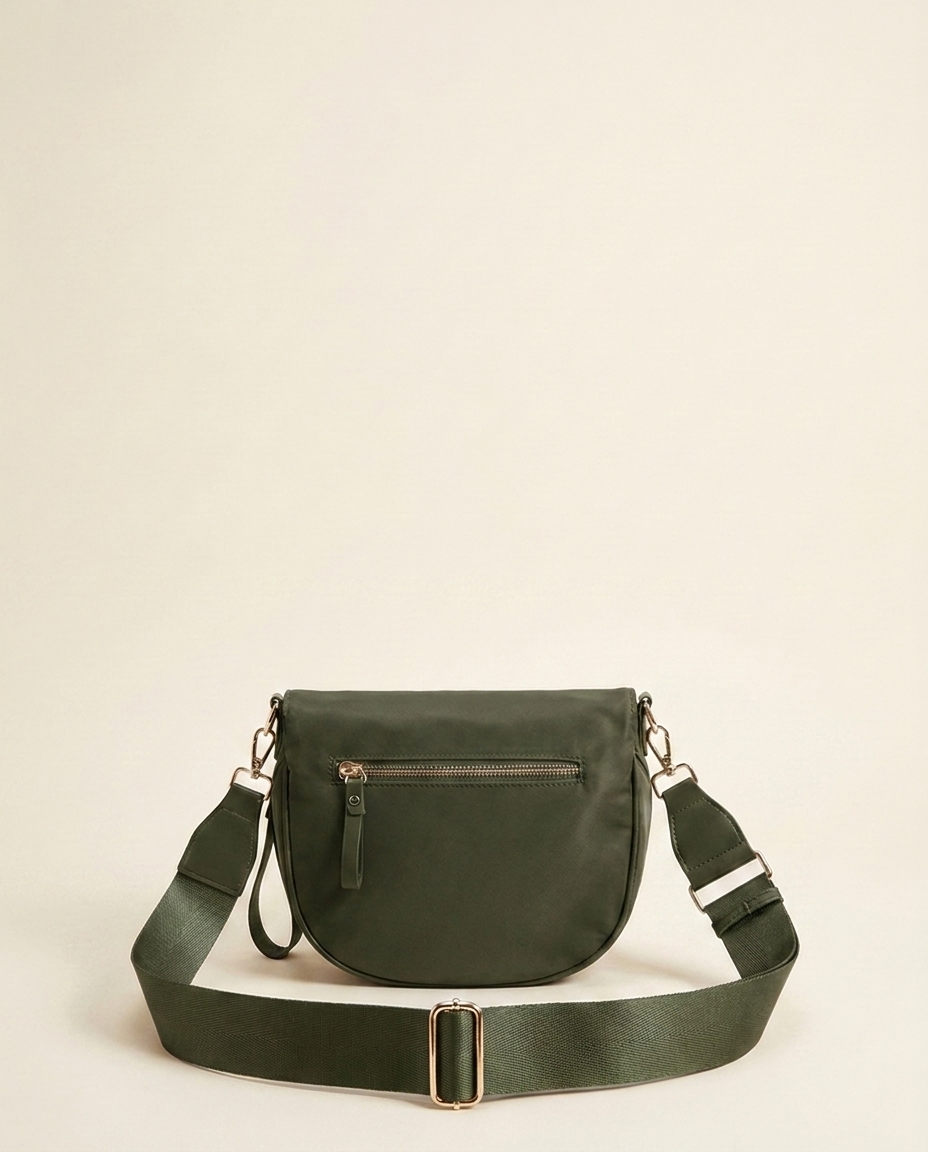 The Crescent Shoulder Bag in Forest — back view with hidden zip pocket