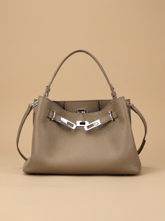 Héloïse Leather Shoulder Bag studio shot on warm sand backdrop
