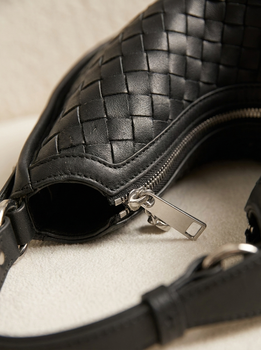 Céleste Leather Crescent Bag - woven leather detail macro