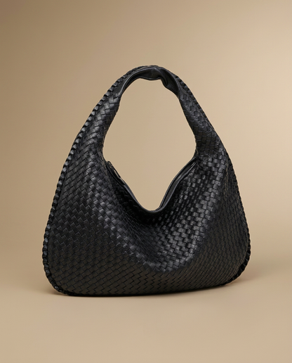 Séverine Woven Tote by Aurevy on a warm sand studio backdrop