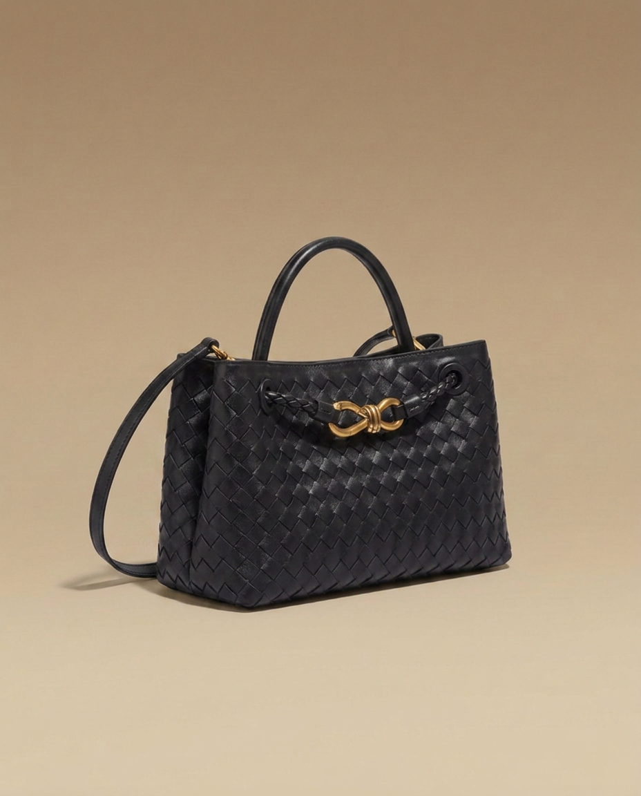 Ondine Woven Shoulder Bag by Aurevy, three-quarter angle on a warm sand studio backdrop
